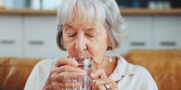 Drinking enough water is essential, especially as we age. If having a water carafe on the table as a kind of “reminder” isn't enough, there are tools available to help you remember to drink. Credit: Shutterstock