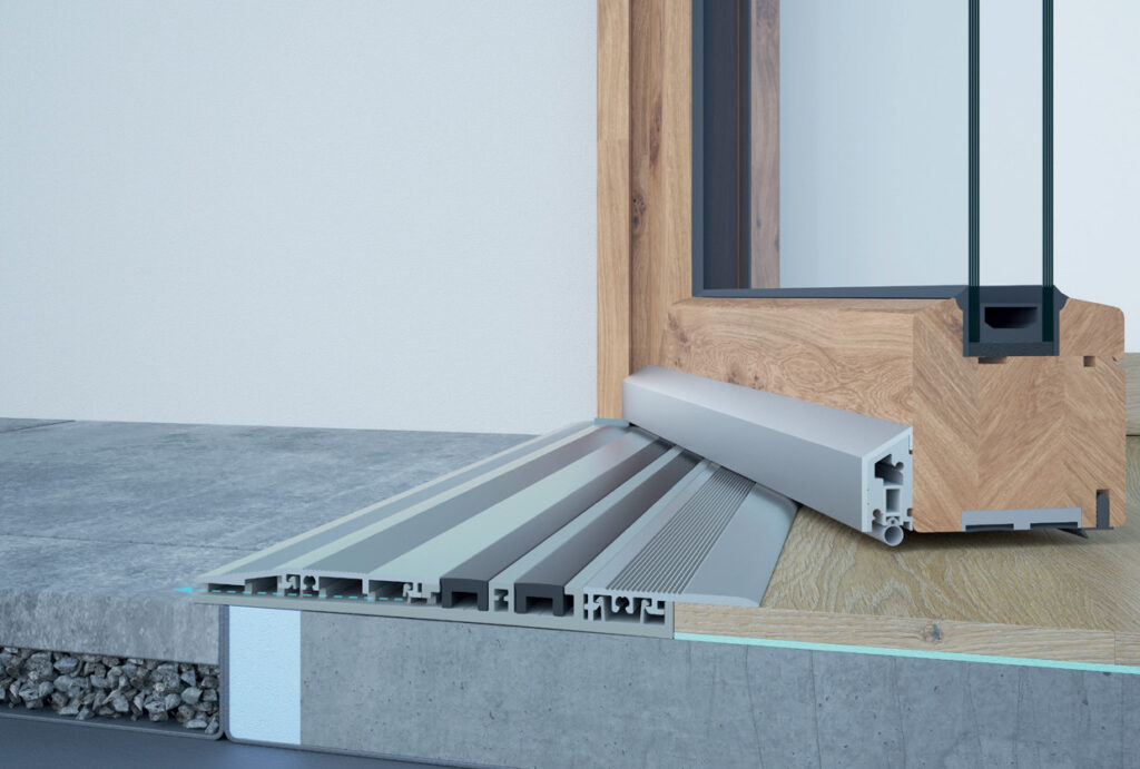 Hier ein Querschnitt durch eine Magnet-Nullschwelle: Sie ist überrollbar, für Innen- und Außentüren verwendbar und kompatibel mit jedem Kunststoff-, Holz-, Holz-Aluminium- oder Aluminiumsystem auf dem Markt. Credit: Alumat